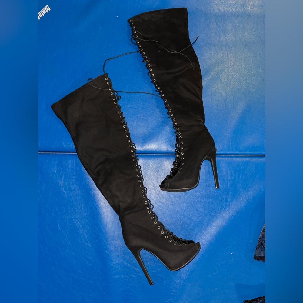 Thigh high heeled boots